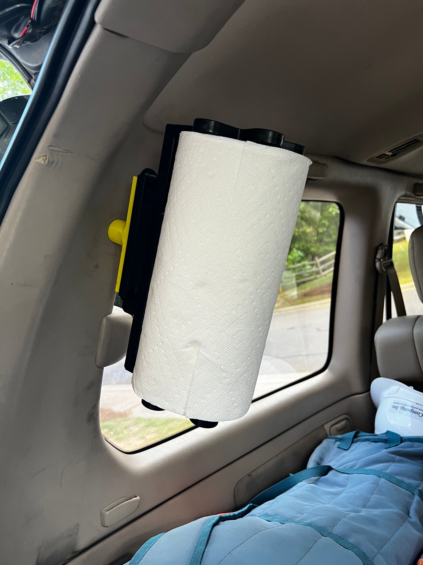 100 Series LC/LX Third Row Seatbelt Paper Towel Mount